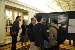 Katy Araujo and Peter Charpentier at REDCap Conference presenting DCare Dashboard, a precursor to YES3 Dashboard.